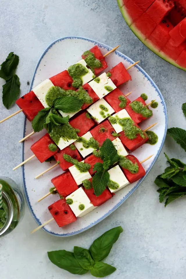 35 Healthy Low Calorie Snacks 30 Watermelon Skewers with Feta and Mint Pesto Flatlay.jpg