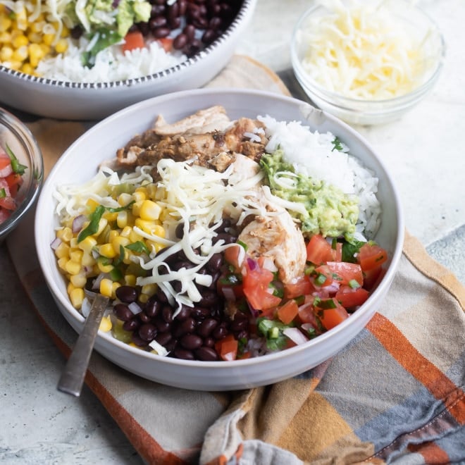 A Chipotle burrito bowl in a white bowl.