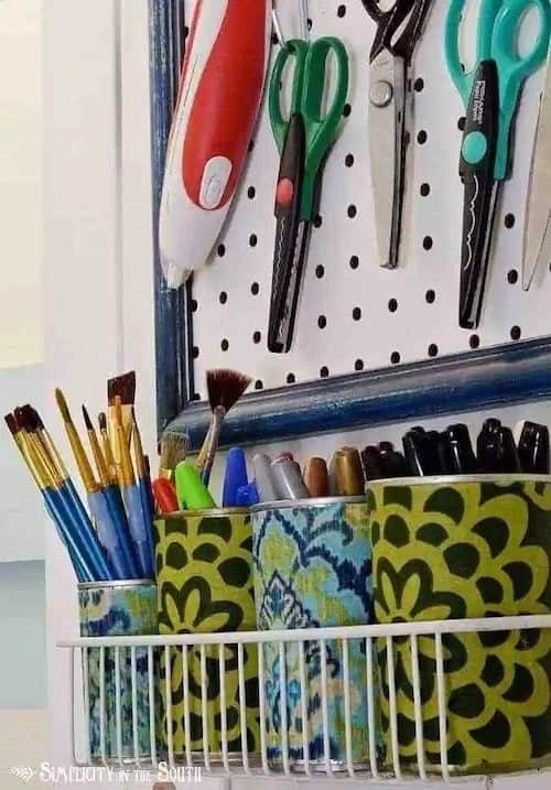 Fabric covered tin cans for storing craft supplies.jpg