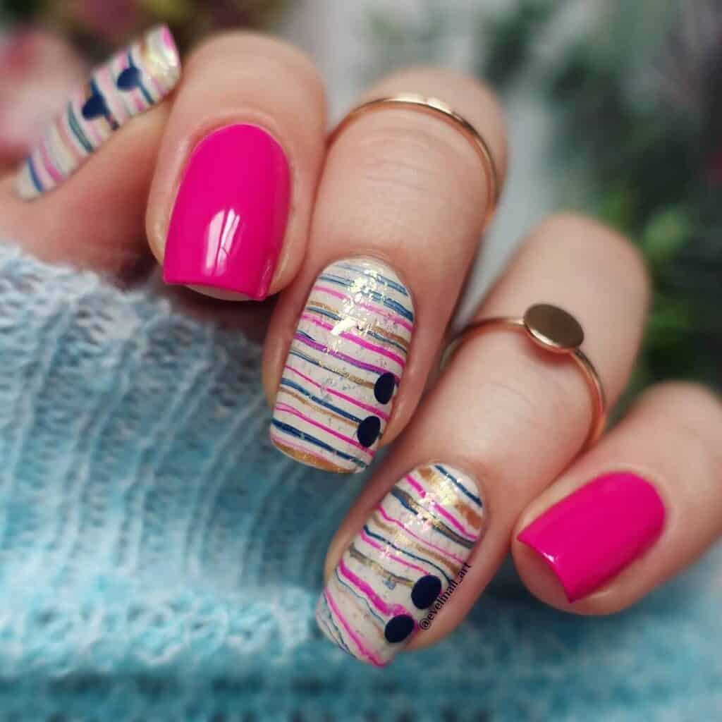 Explore a variety of pink nail designs, from bright and cute styles to festive Christmas nails with intricate patterns and decorations.