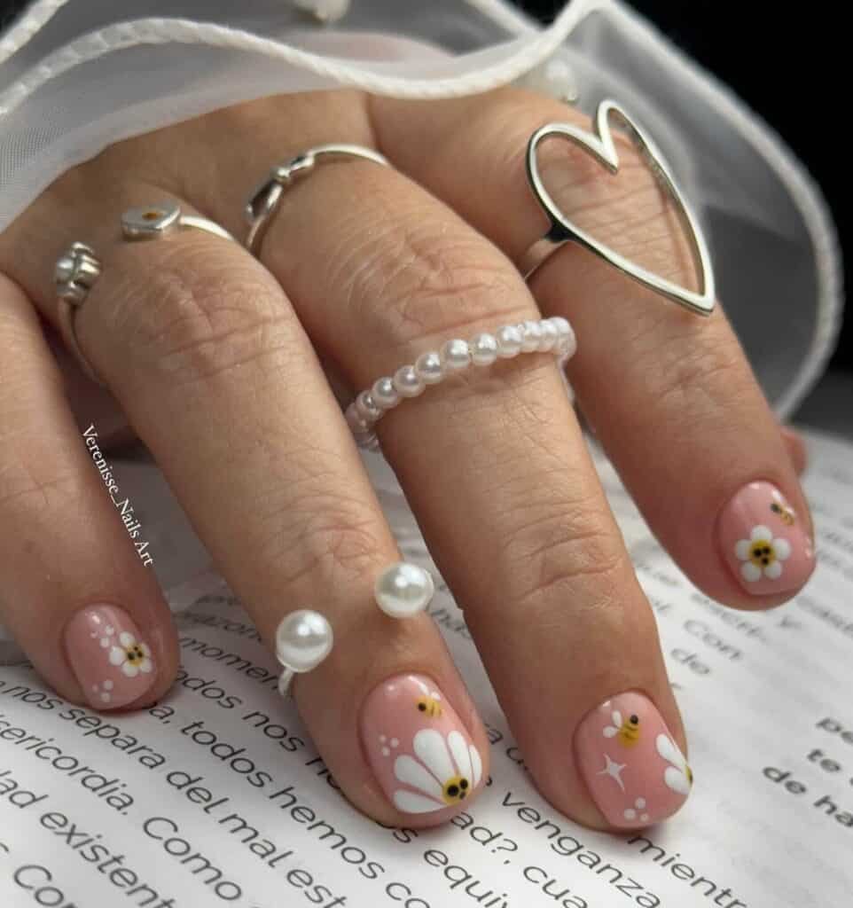A collection of vibrant and artistic summer nail art on impeccably groomed nails.
