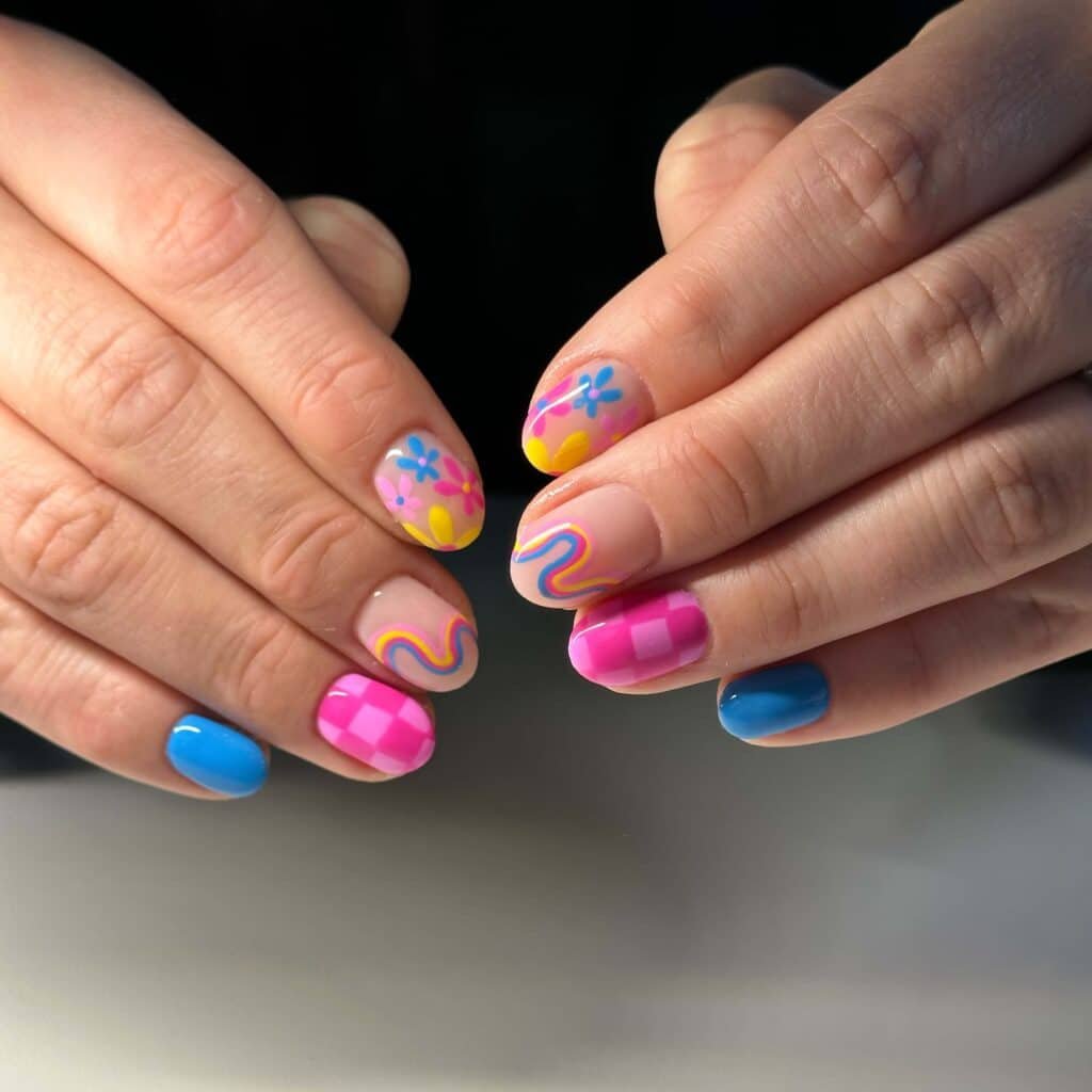 A collection of vibrant and artistic summer nail art on impeccably groomed nails.