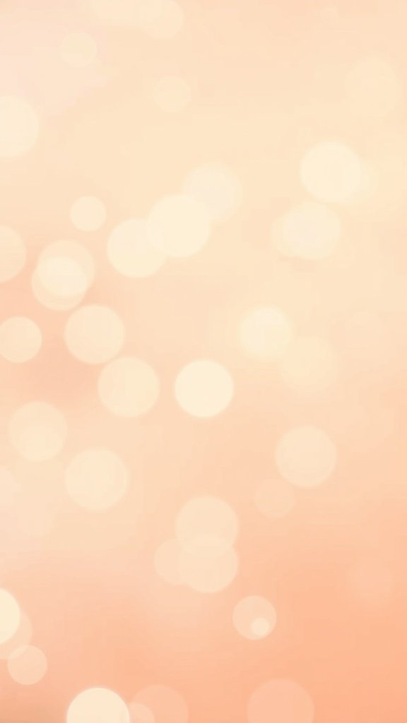 Soft peach and cream background with bokeh effect